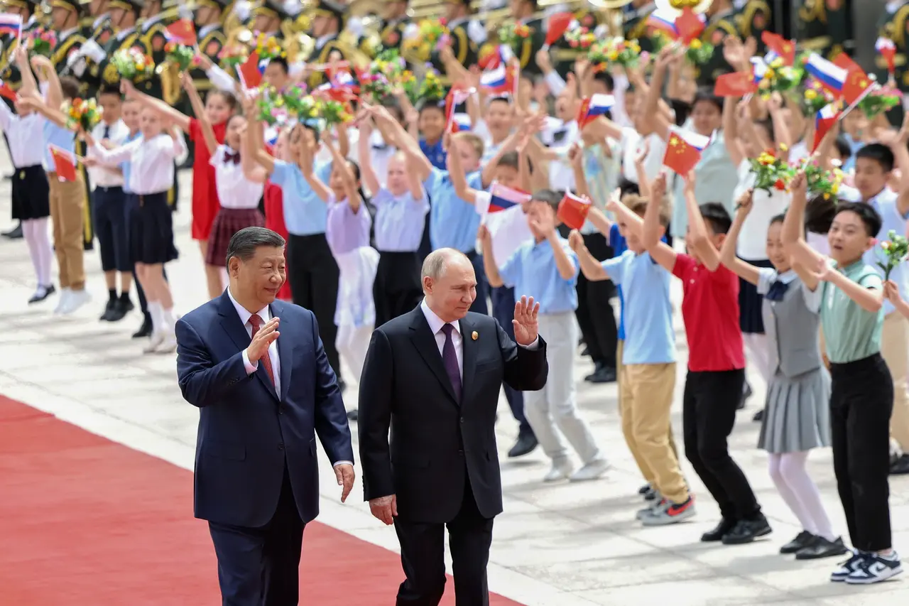 Putin Welcomed by Children at Tiananmen Square During Beijing State Visit